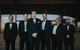 men wearing tuxedos